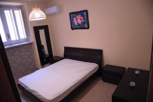 Posteľ alebo postele v izbe v ubytovaní VillaB&BFrancesca&Gioia