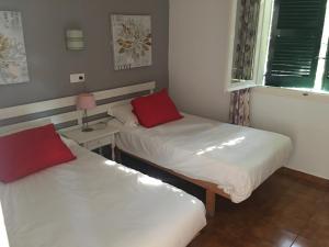 Apartamentos Encanto Del Mar客房内的一张或多张床位