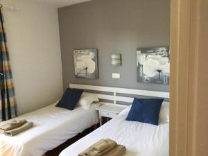 Apartamentos Encanto Del Mar客房内的一张或多张床位