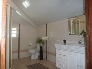 Ванна кімната в Chambres d'hôtes DORIS