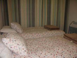 Postel nebo postele na pokoji v ubytování Anthony's Place