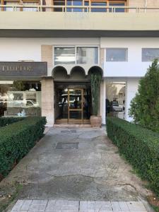 The facade or entrance of Cozy Studio in Central Glyfada