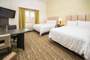 Кровать или кровати в номере Candlewood Suites - Ft Walton Bch - Hurlburt Area by IHG +13 фотографий