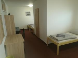Postel nebo postele na pokoji v ubytování Penzion Zátiší