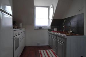 Kuchyň nebo kuchyňský kout v ubytování Vue mer exceptionnelle dans bourg authentique