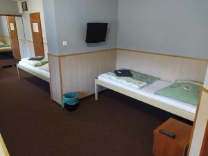 Postel nebo postele na pokoji v ubytování Penzion Zátiší