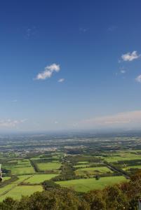 a view of the countryside from the top of a hill at Hotel Nikko Northland Obihiro in Obihiro