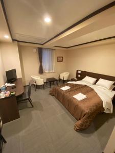 Postel nebo postele na pokoji v ubytování HOTEL SOSHA