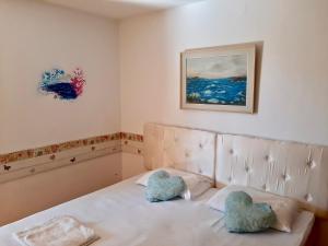 Postel nebo postele na pokoji v ubytování Apartments Unija Duga Uvala