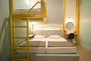 Letto o letti in una camera di Hugger Hostel