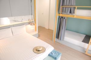 Letto o letti in una camera di Hugger Hostel