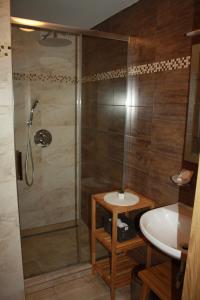 Koupelna v ubytování Hotel Farma Vysoká