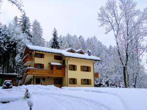 AL RANCH WELLNESS CADORE DOLOMITI APARTMENTS vicino Cortina Olimpiadi 2026 e Misurina Tre Cime Lavaredo v zimě