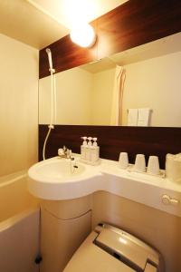 Ванна кімната в Hotel Matsumoto Yorozuya