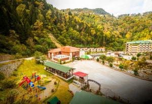 an aerial view of a park with a playground at Ridos Thermal Hotel & Spa in Kürreiseba