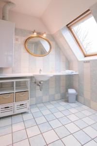 Koupelna v ubytování Ferienhaussiedlung Strandperlen Sanddornhof 7a (Typ VIII)