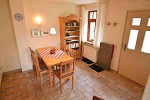 Kuchyň nebo kuchyňský kout v ubytování Ferienhaussiedlung Strandperlen Sanddornhof 2c (Typ II) + 12 fotografií