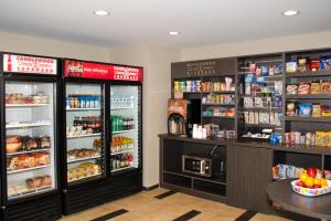 a grocery store with two refrigerators and food at Candlewood Suites - Lancaster West, an IHG Hotel in Lancaster