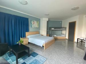 Postel nebo postele na pokoji v ubytování Hotel Santa Giulia