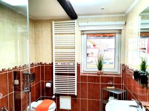Ένα μπάνιο στο Apart Hotel Wernigerode