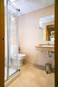 Ένα μπάνιο στο Apartamentos Turísticos La Castilleja