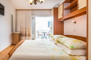 Postel nebo postele na pokoji v ubytování Villa Roko