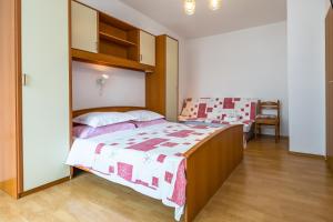 Postel nebo postele na pokoji v ubytování Villa Roko