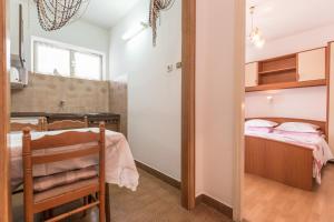 Postel nebo postele na pokoji v ubytování Villa Roko