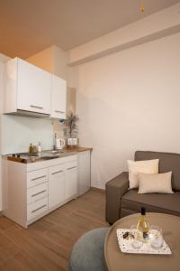 Kuchyňa alebo kuchynka v ubytovaní Palm Luxury Studios