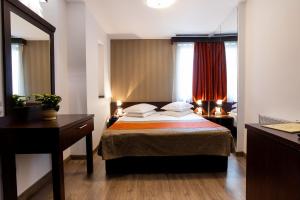 Letto o letti in una camera di Hotel Duke Armeneasca - Ex Tempo