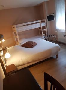 Postel nebo postele na pokoji v ubytování Ambiance Hotel