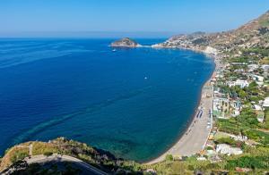 an aerial view of a beach and the ocean at Hotel San Giorgio Terme in Ischia