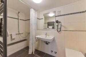 Koupelna v ubytování Hotel Kirchhainer Hof