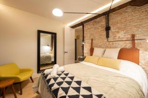 Postel nebo postele na pokoji v ubytování Santiago by Staynnapartments
