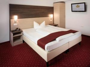Krevet ili kreveti u jedinici u objektu Hotel Marc Aurel