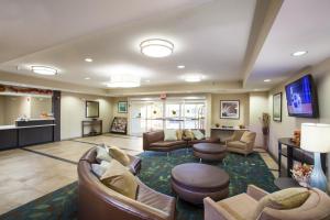 a large living room with couches and chairs at Candlewood Suites New Braunfels, an IHG Hotel in New Braunfels
