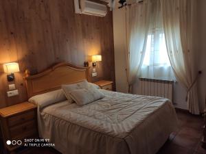 Posteľ alebo postele v izbe v ubytovaní Casa Rural IRIS