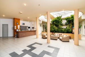 Kuchyň nebo kuchyňský kout v ubytování Sabina Hotel