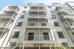 an apartment building with balconies on the side of it at Nadland Apartment Wehlistrasse in Vienna