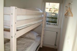 Bunk bed o mga bunk bed sa kuwarto sa Rekerlanden 257