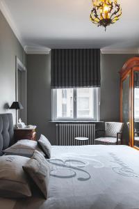 Postel nebo postele na pokoji v ubytování B&B La Passion Interdite