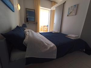 Postel nebo postele na pokoji v ubytování Atlas-Unlimited Sea View Apartment
