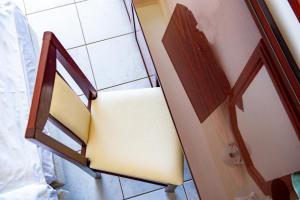 Postel nebo postele na pokoji v ubytování Dionisos Hotel