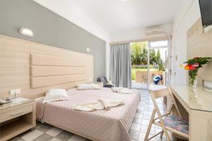 Postel nebo postele na pokoji v ubytování Sabina Hotel