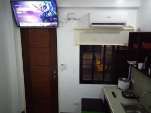Kuchyň nebo kuchyňský kout v ubytování Clark-Pad Inn, Angeles City