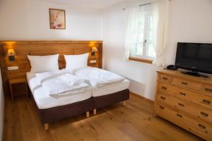 Postel nebo postele na pokoji v ubytování Landhaus Langeck