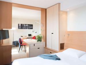 Aparthotel Adagio Toulouse Centre Ramblas客房内的一张或多张床位