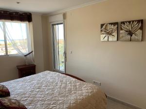 Ένα ή περισσότερα κρεβάτια σε δωμάτιο στο Apartamento en Javea