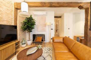 TV a/nebo společenská místnost v ubytování Santiago by Staynnapartments