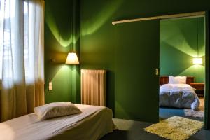 Postel nebo postele na pokoji v ubytování Hotel Polydrosos